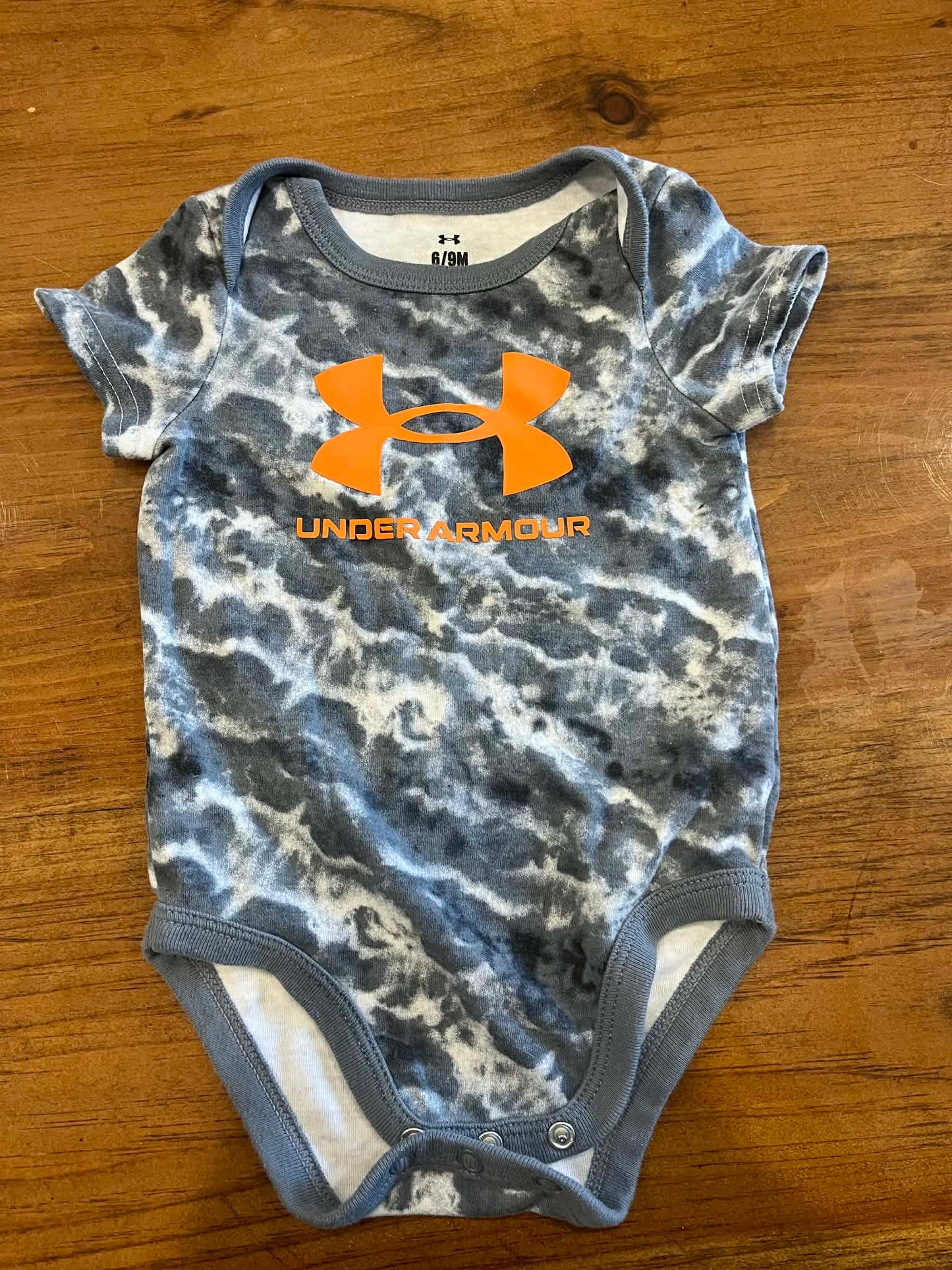 Cache-couche under armour 6-9 mois