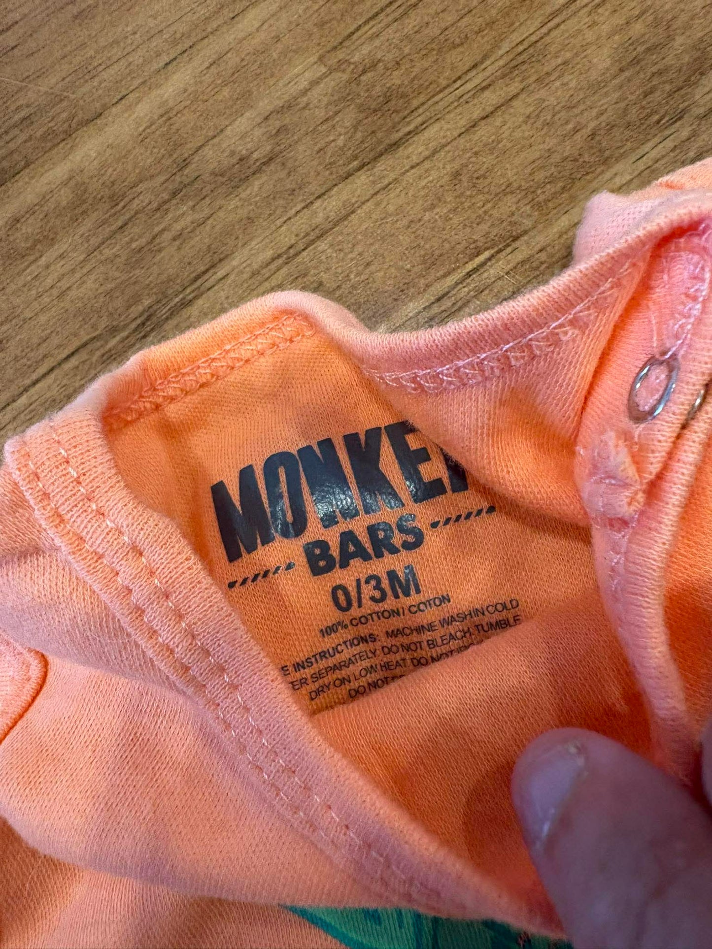 Cache-couche monkey bar 0-3 mois état neuf