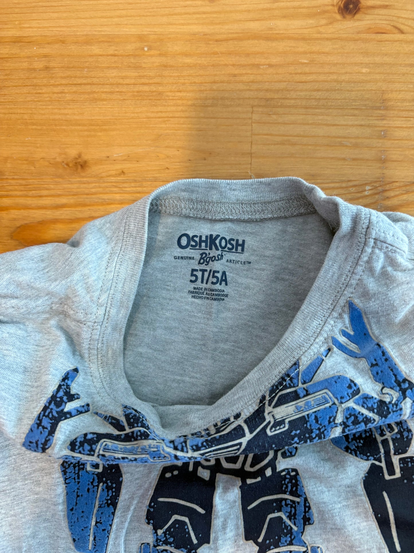 Gilet oskosh 5 ans
