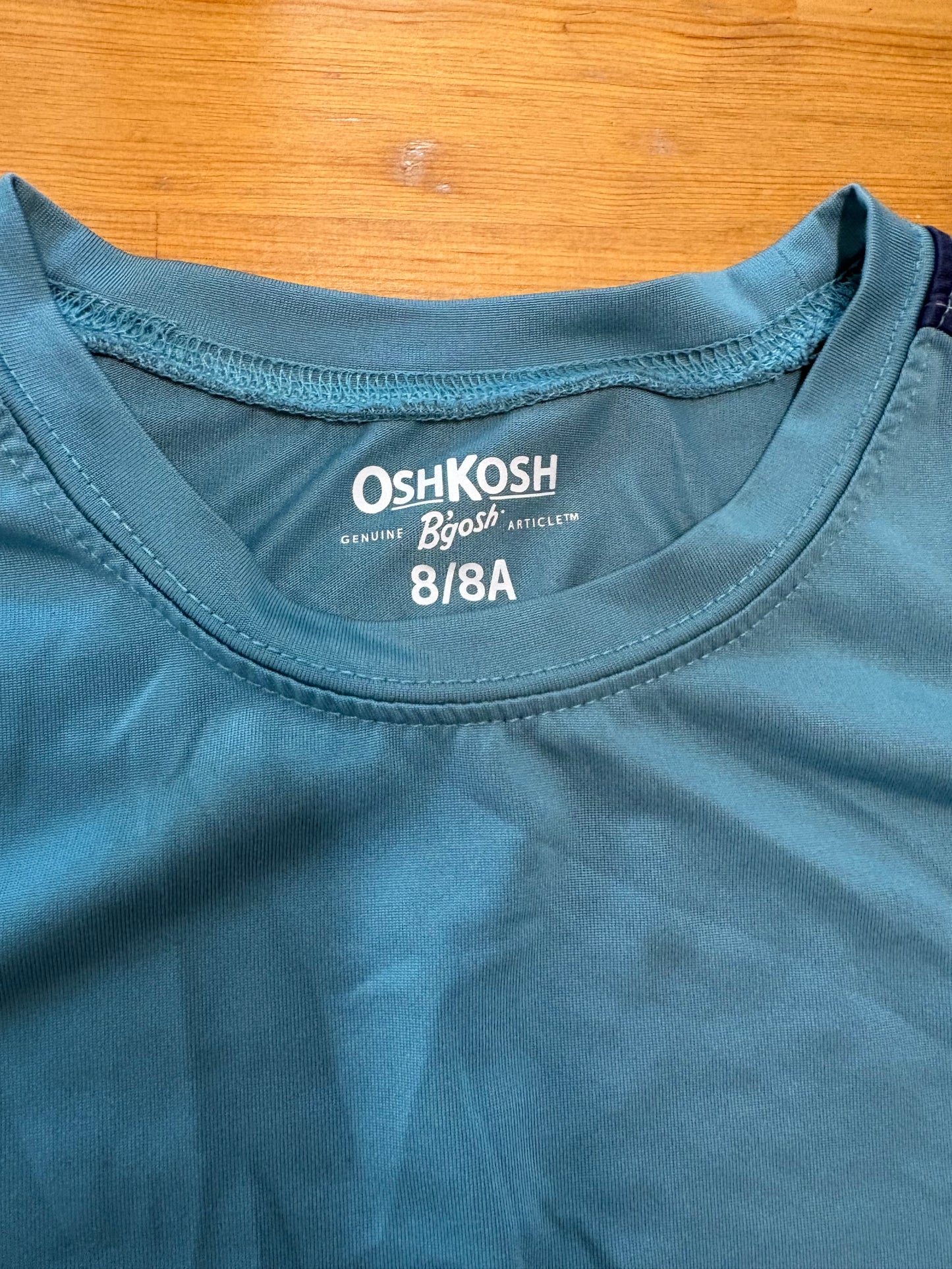 Gilet oskosh 8ans état neuf