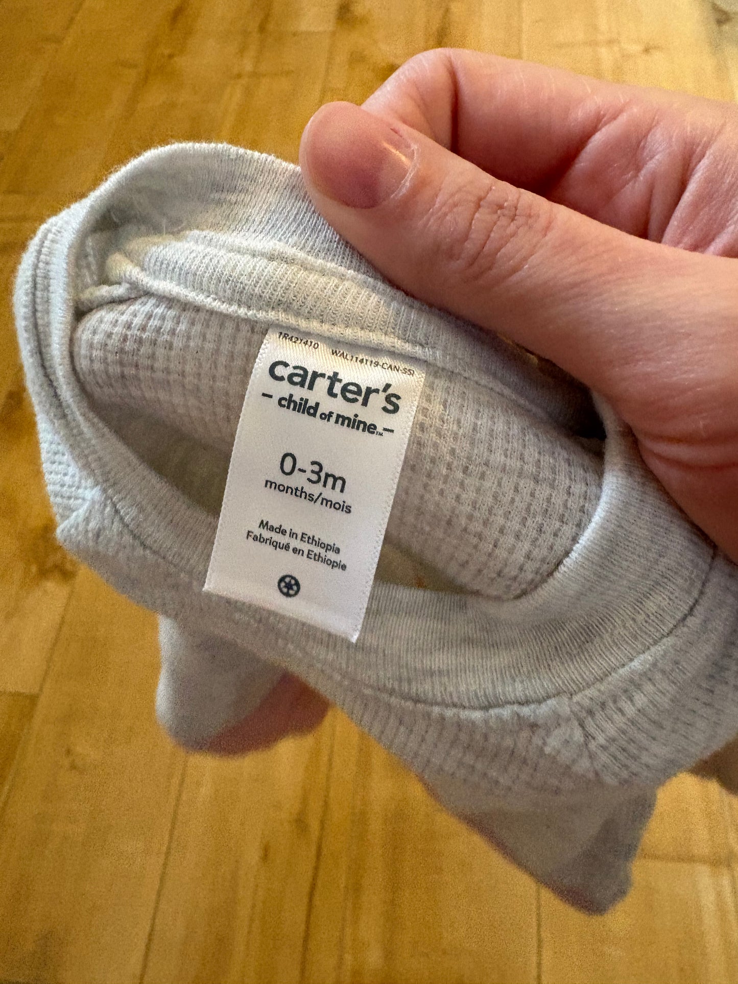 Gilet carter’s état neuf 0-3 mois