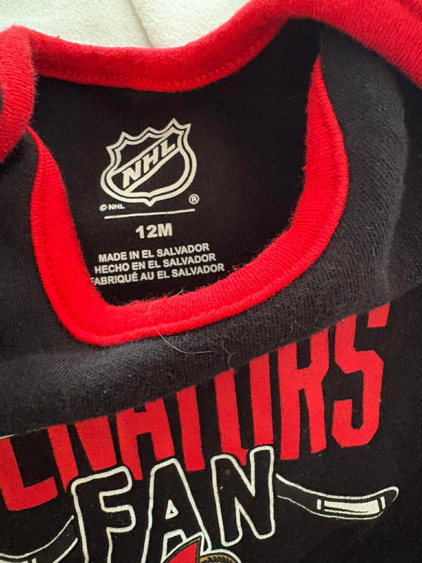 Cache-couche nhl 12 mois état neuf
