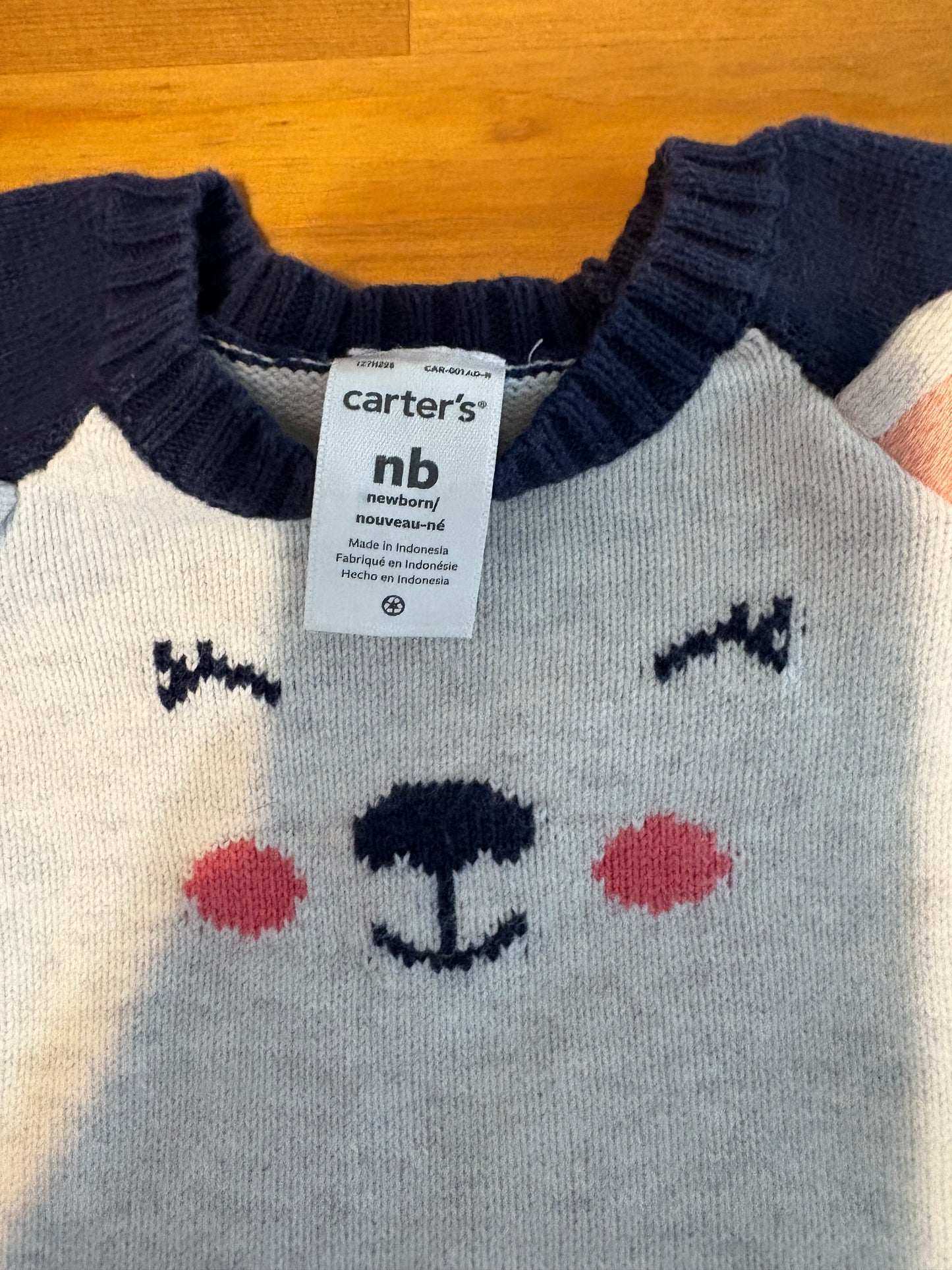 Gilet carter’s nouveau-née