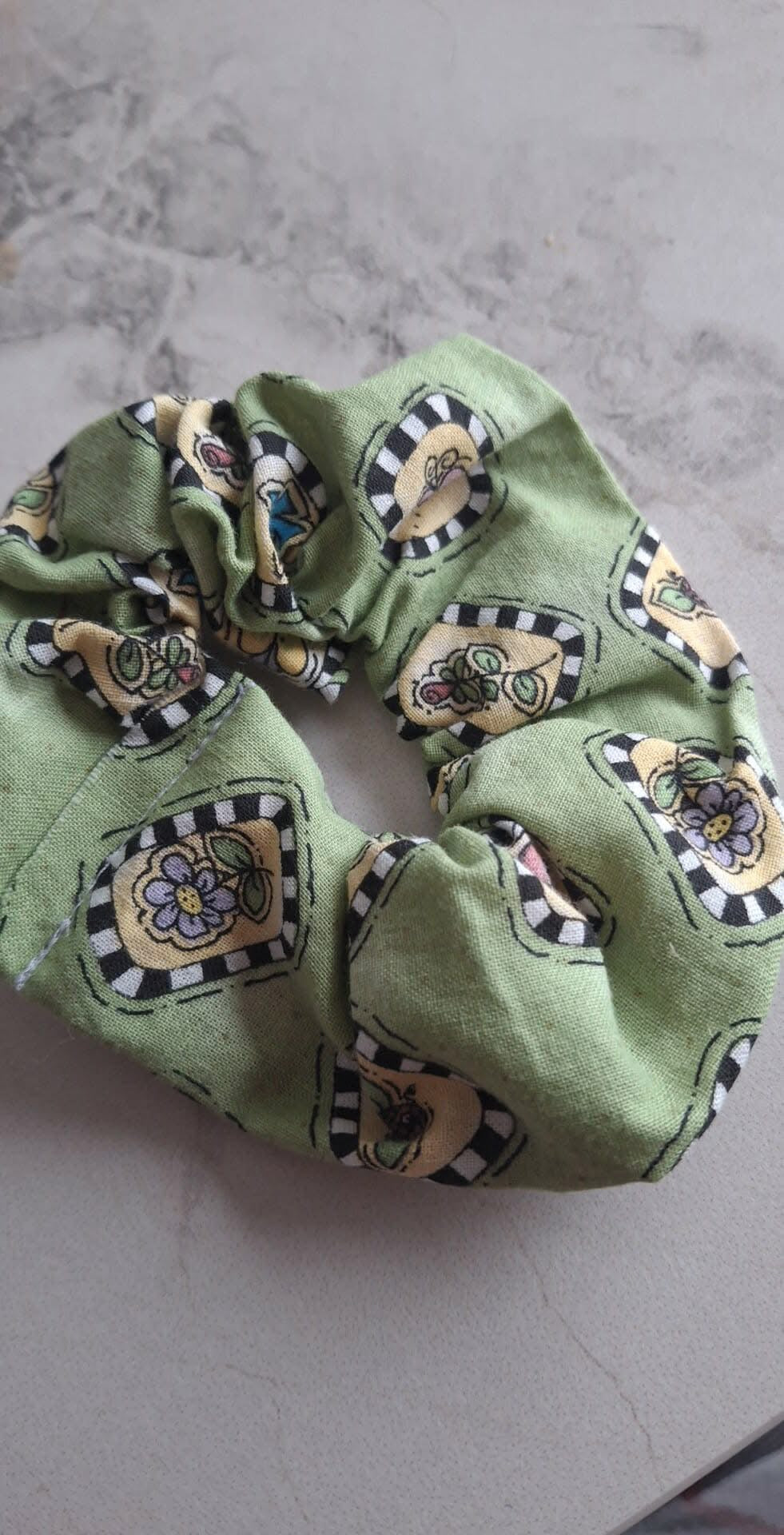 Chouchou vert et fleur