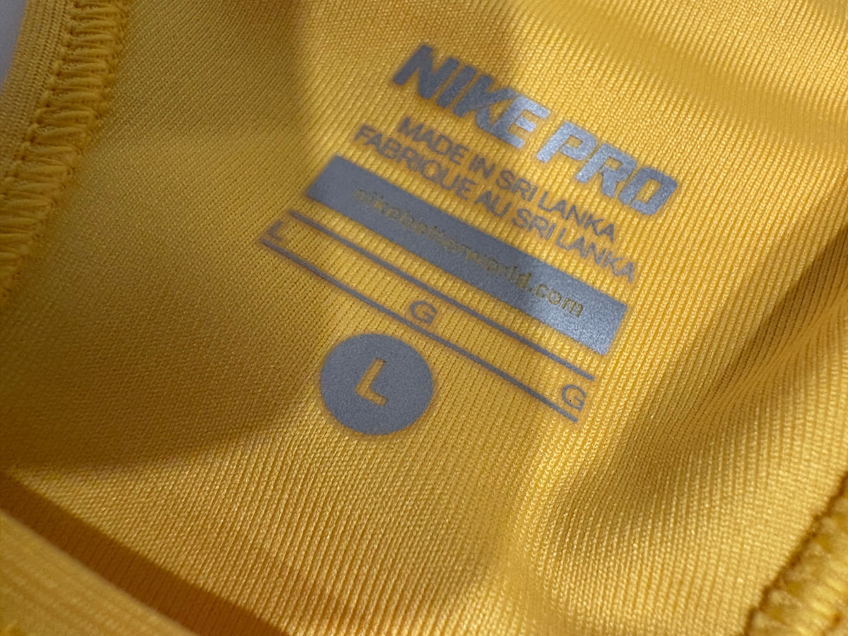 Top de sport Nike large (cmb)