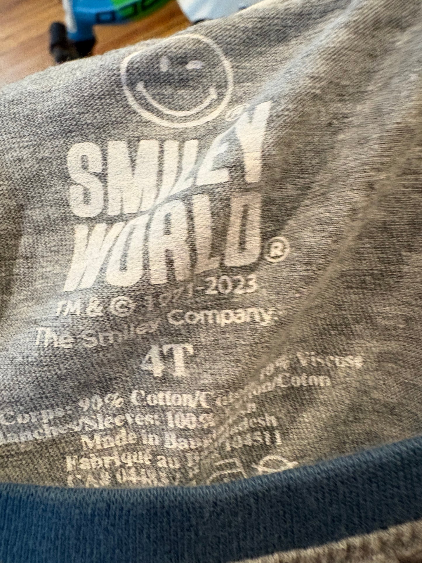 Chandail smiley world 4T