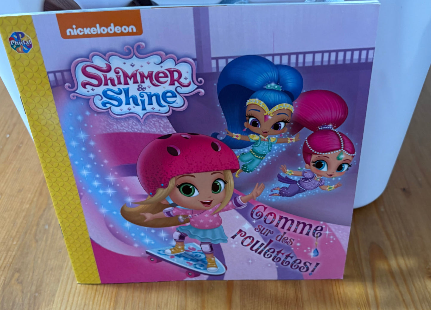 Livre shimmee shine « comme sur des roulette »nickelodeon