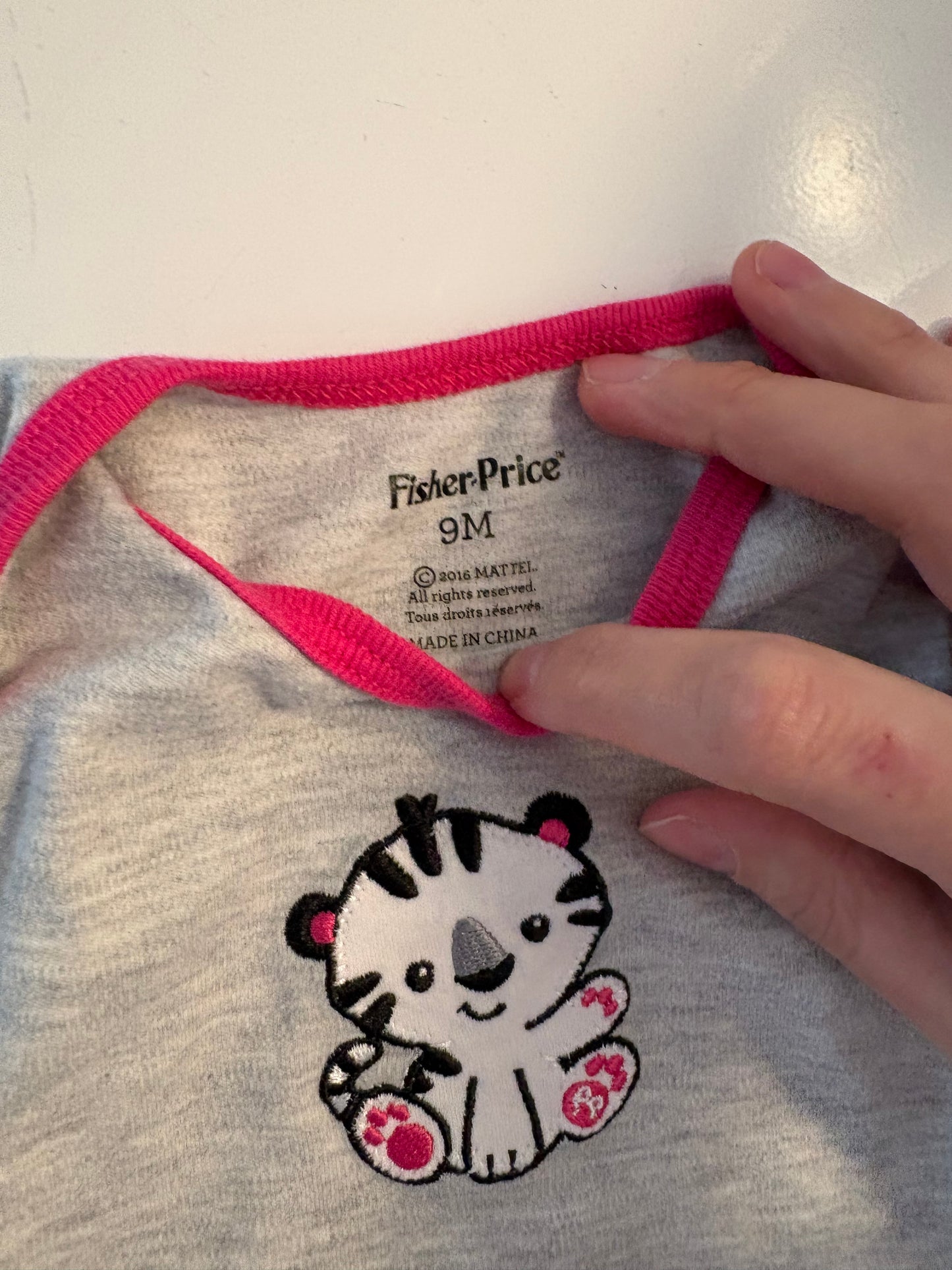 Cache-couche fisher price 9mois