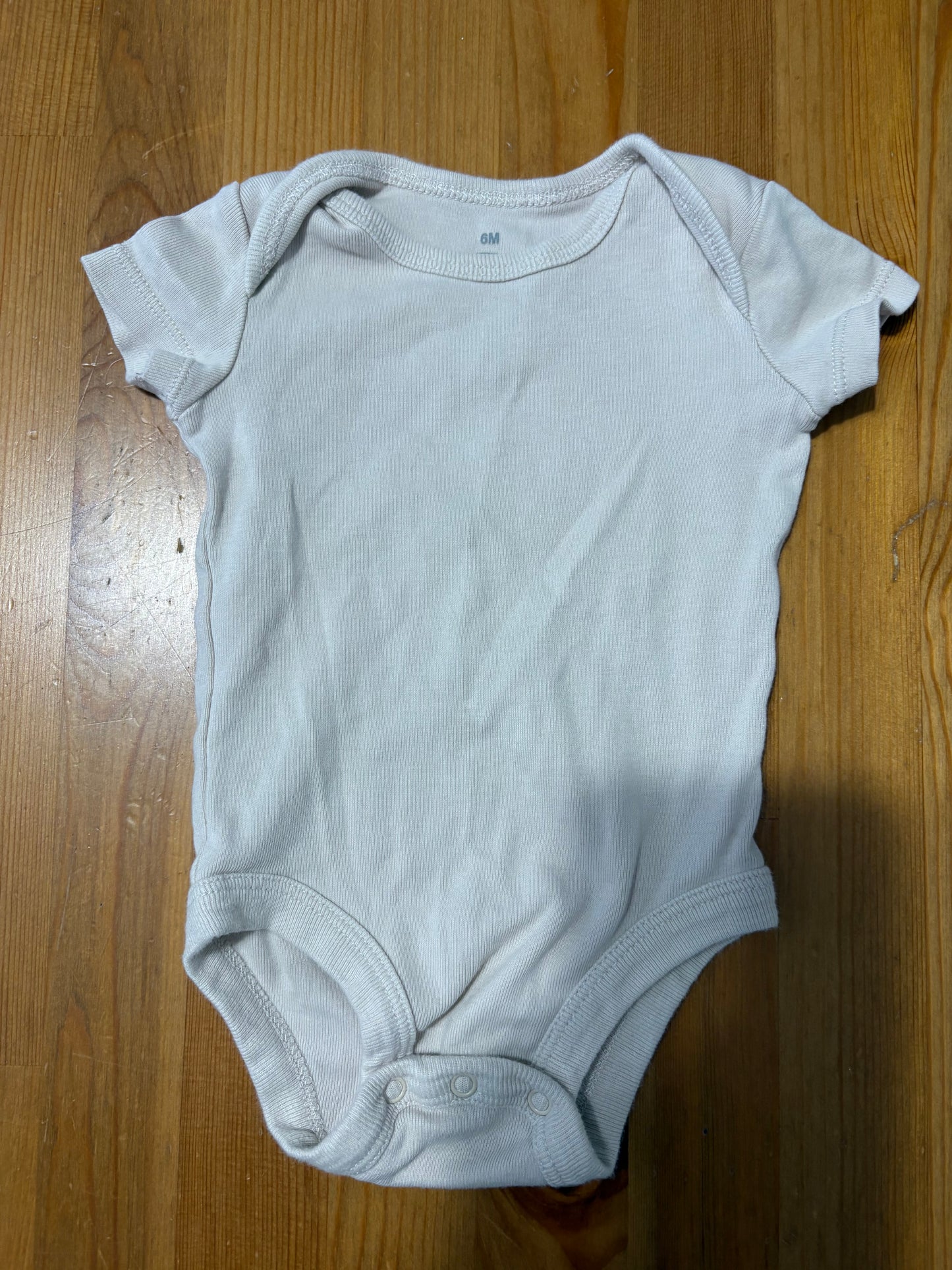 Cache-couche tag 6 mois