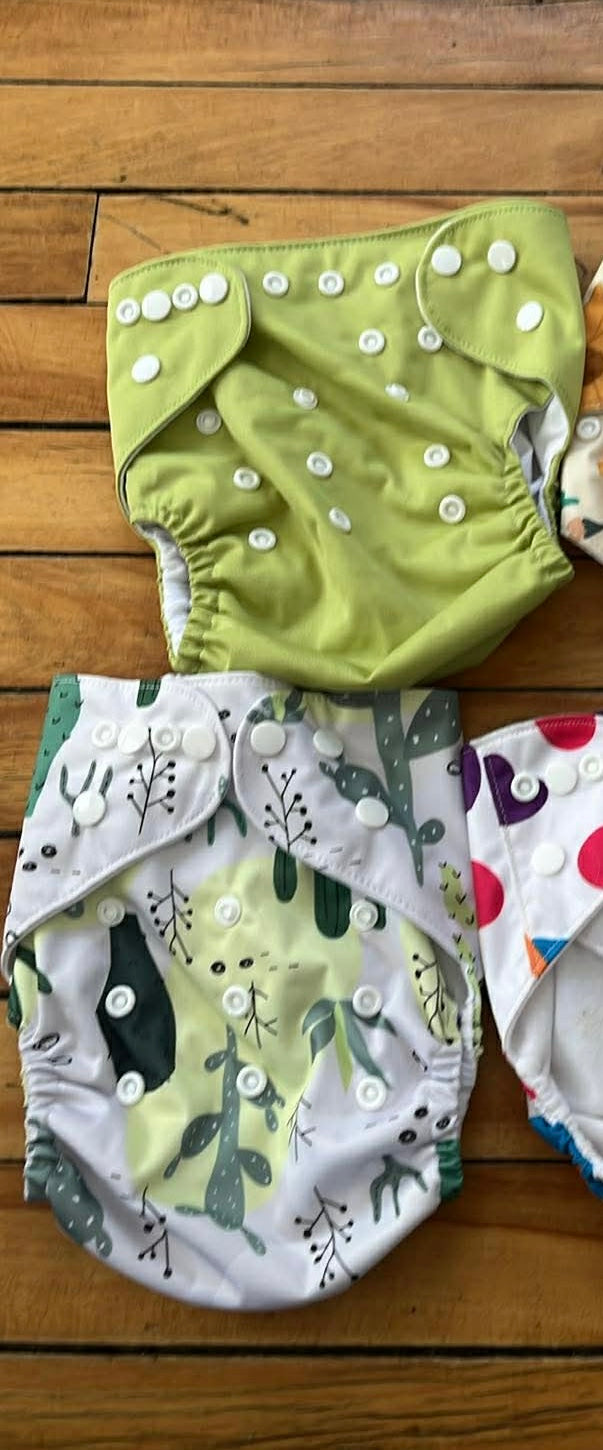 Ensemble 2 couche lavable état neuf taille : 0-12 mois