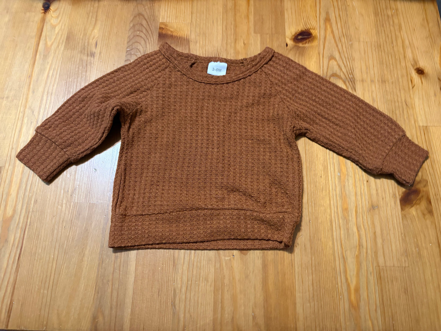 Gilet neuf 3-6 mois (internet)