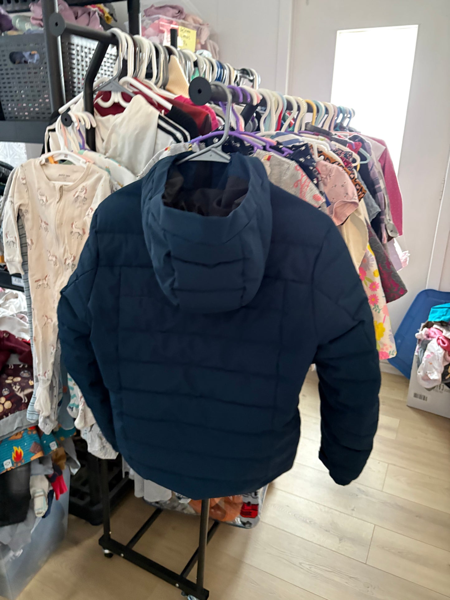 Manteau rossignol 12T valeur 255$ état neuf