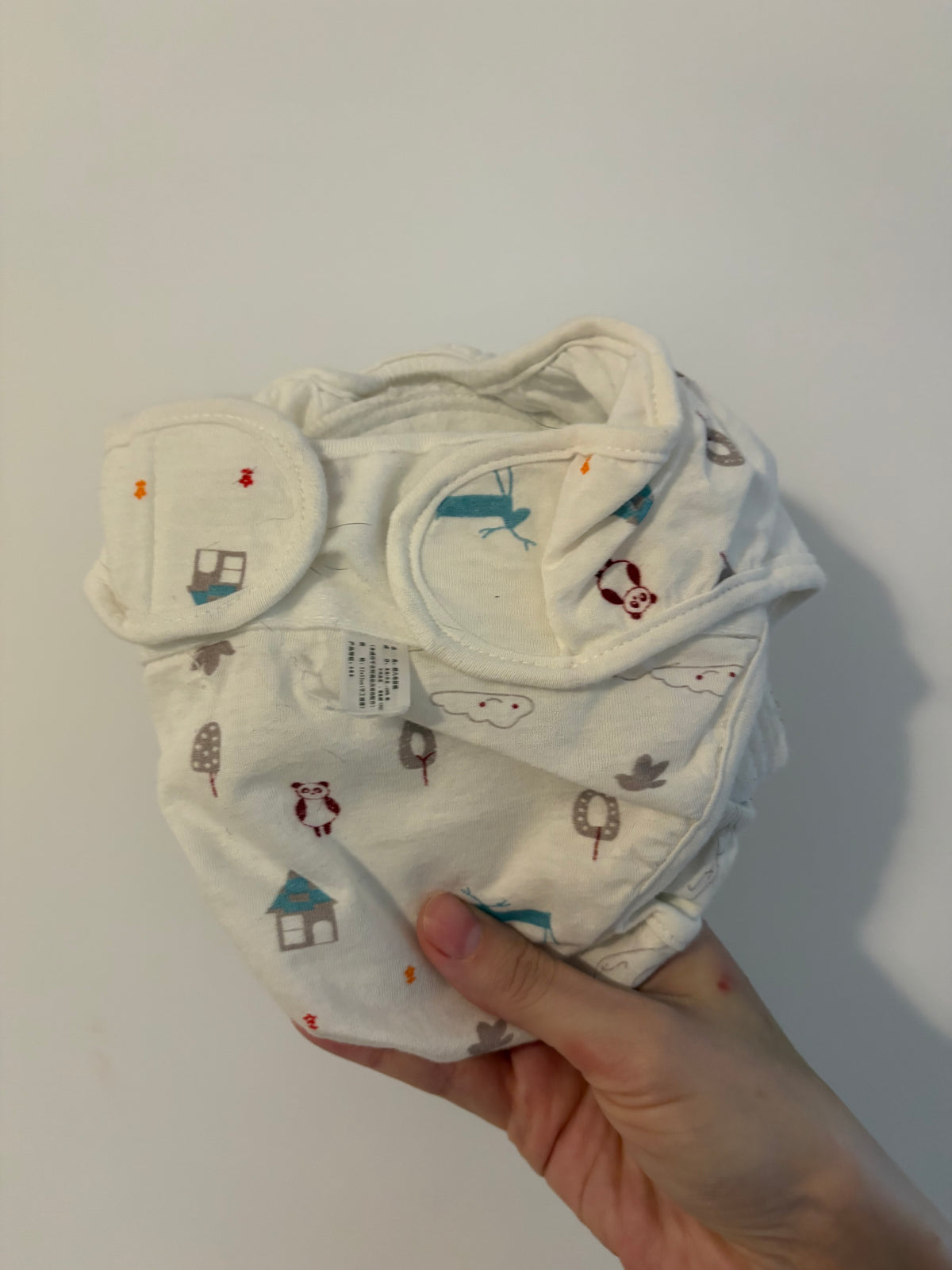 Couche lavable jamais utilisé sauf sur poupée. 0-3 mois