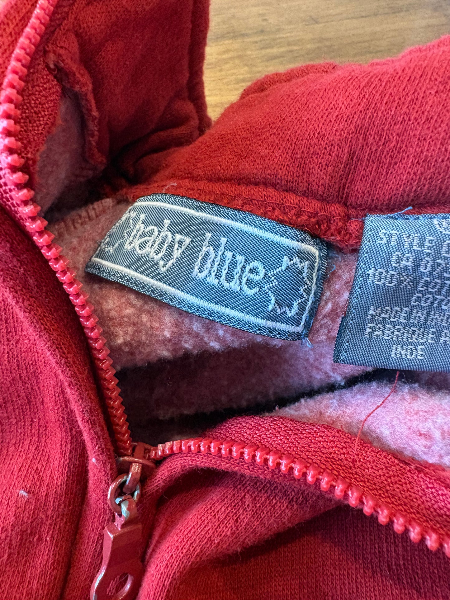 Veste baby bleu 6-9 environs