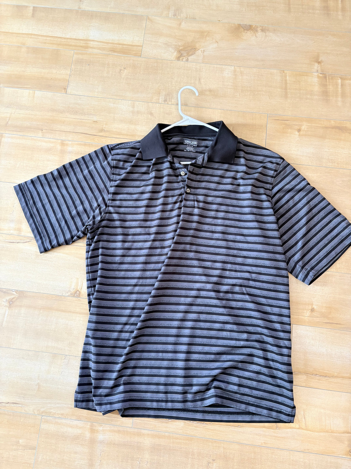 Polo homme kirkland large état neuf
