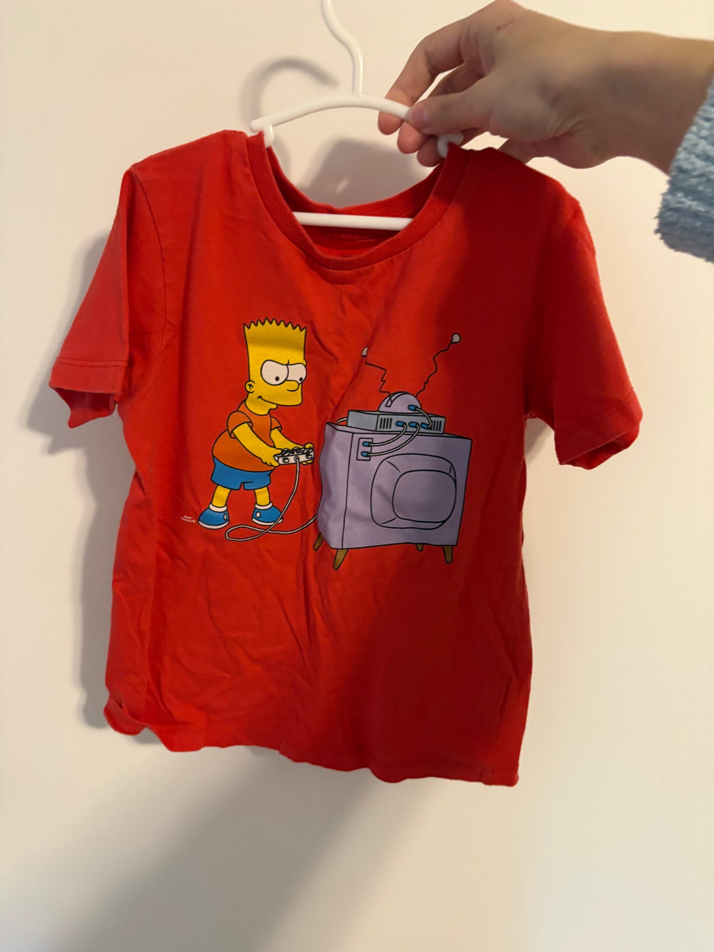 t-shirt simpson 7-8 ans environ