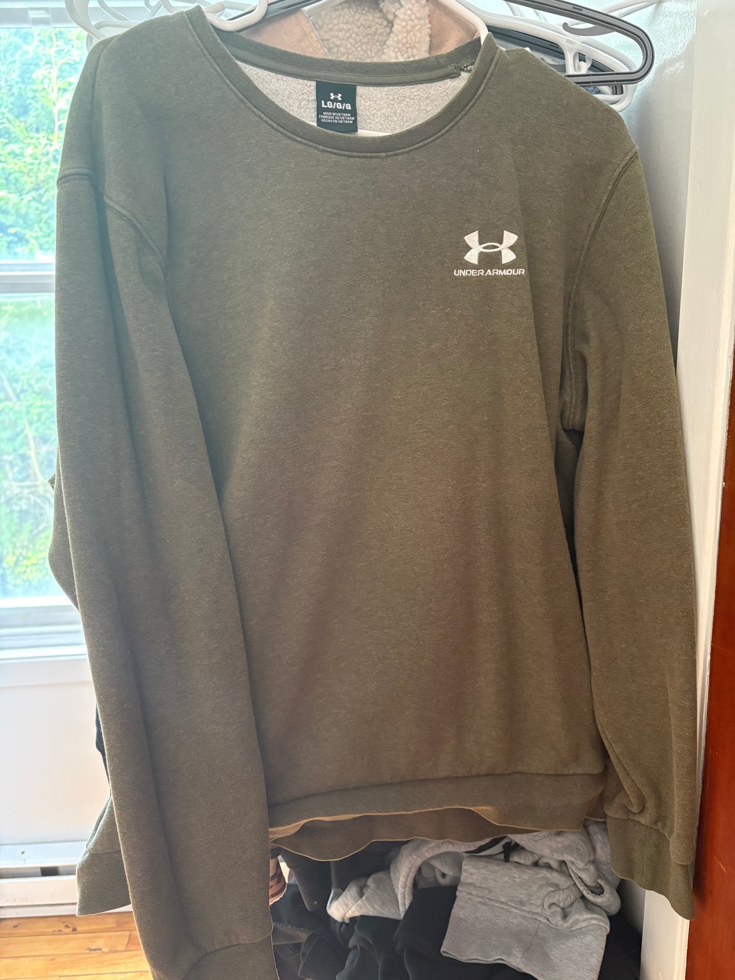 Hoodie under armour Large femme (cmb)