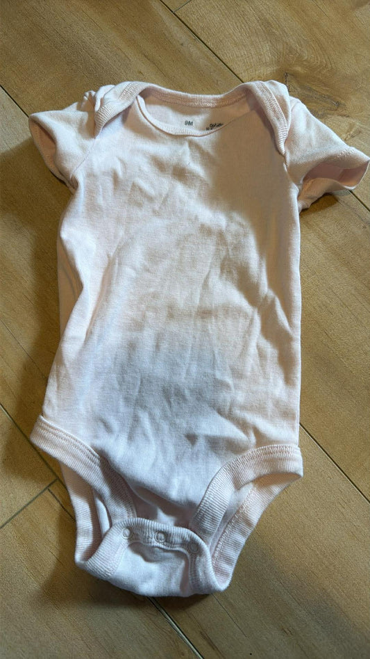 Cache-couche tag 9 mois