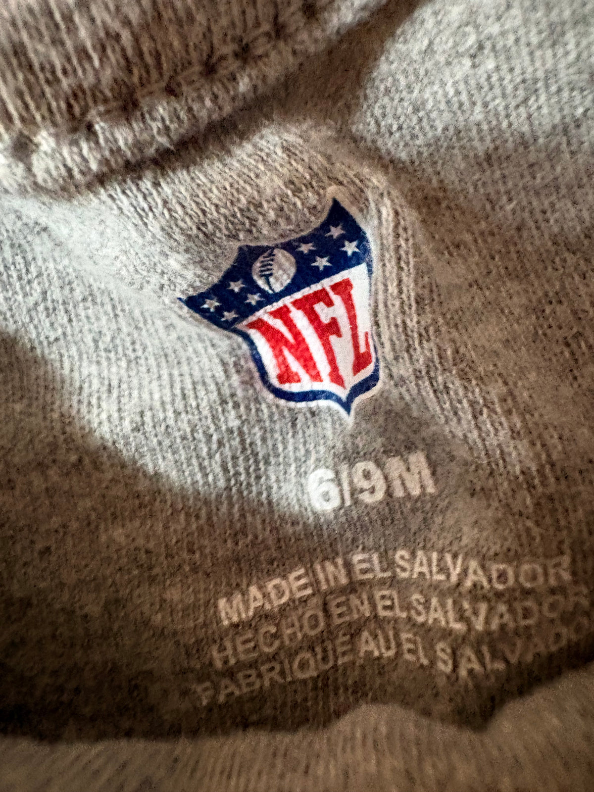 Cache couche 6-9 mois NFL (cmb)