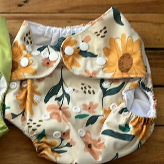 Couche lavable état neuf taille : 0-12 mois