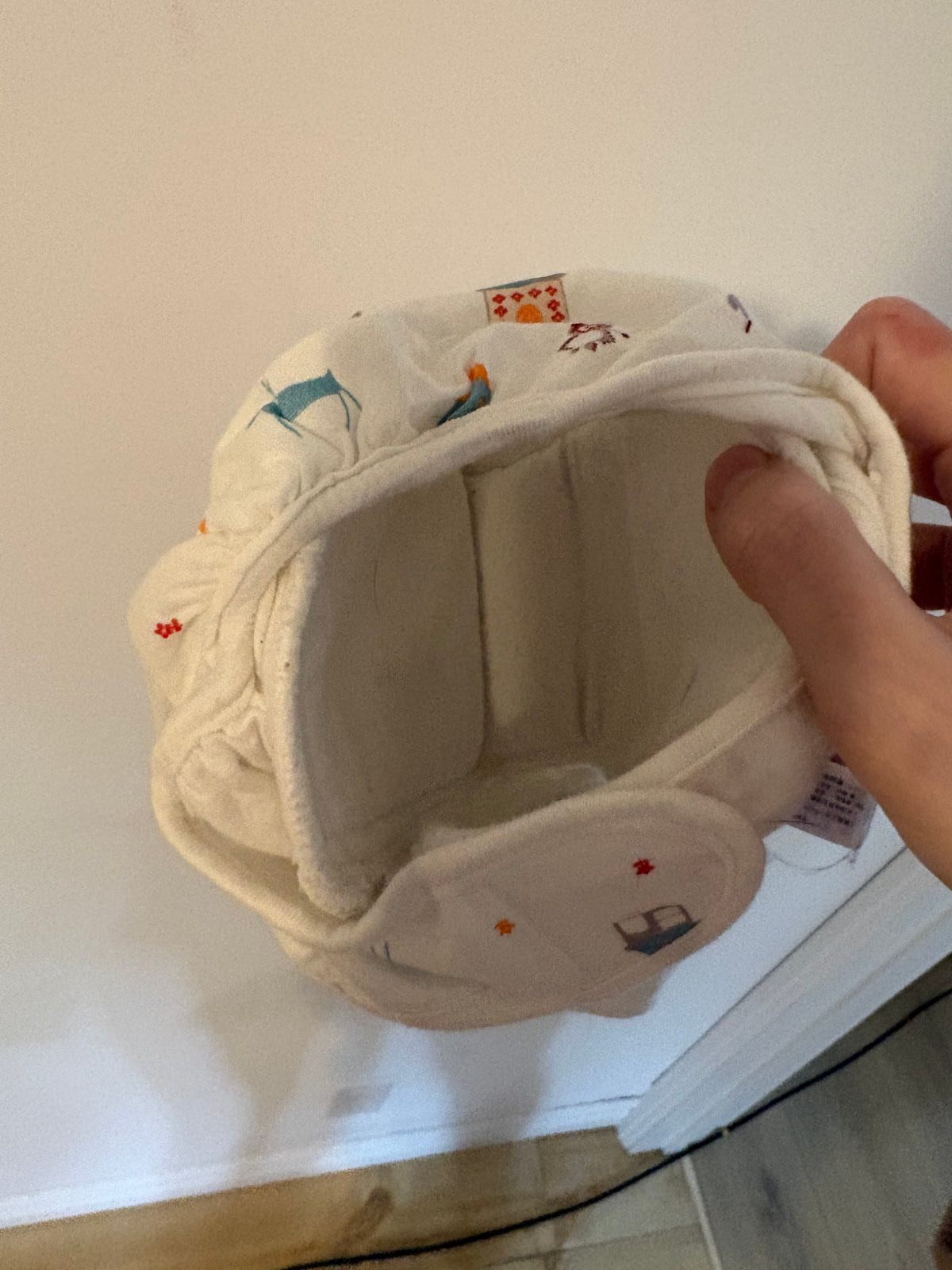 Couche lavable jamais utilisé sauf sur poupée. 0-3 mois