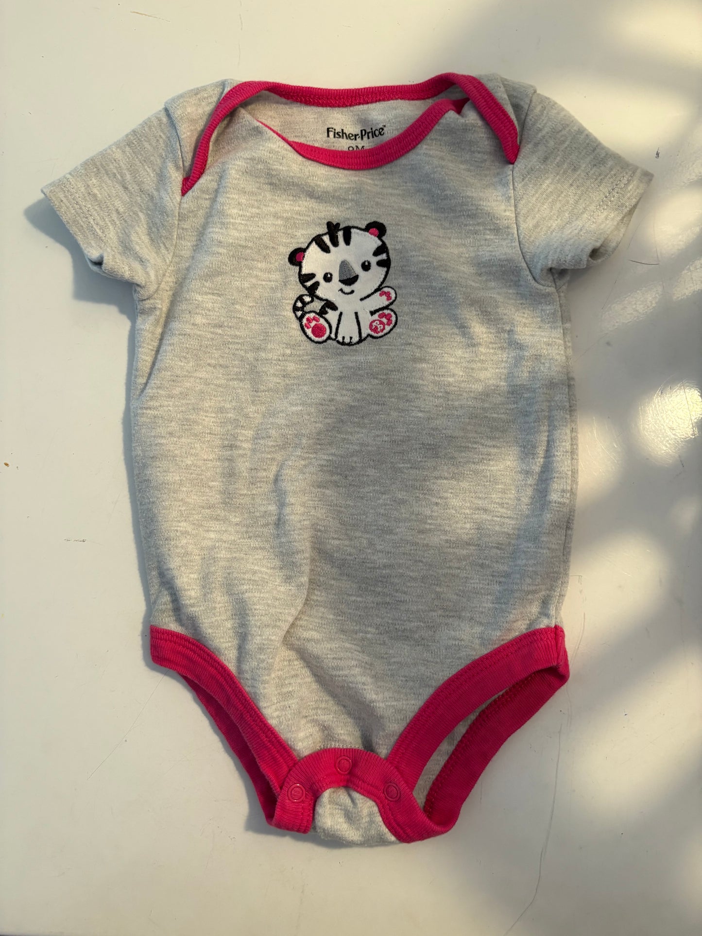 Cache-couche fisher price 9mois