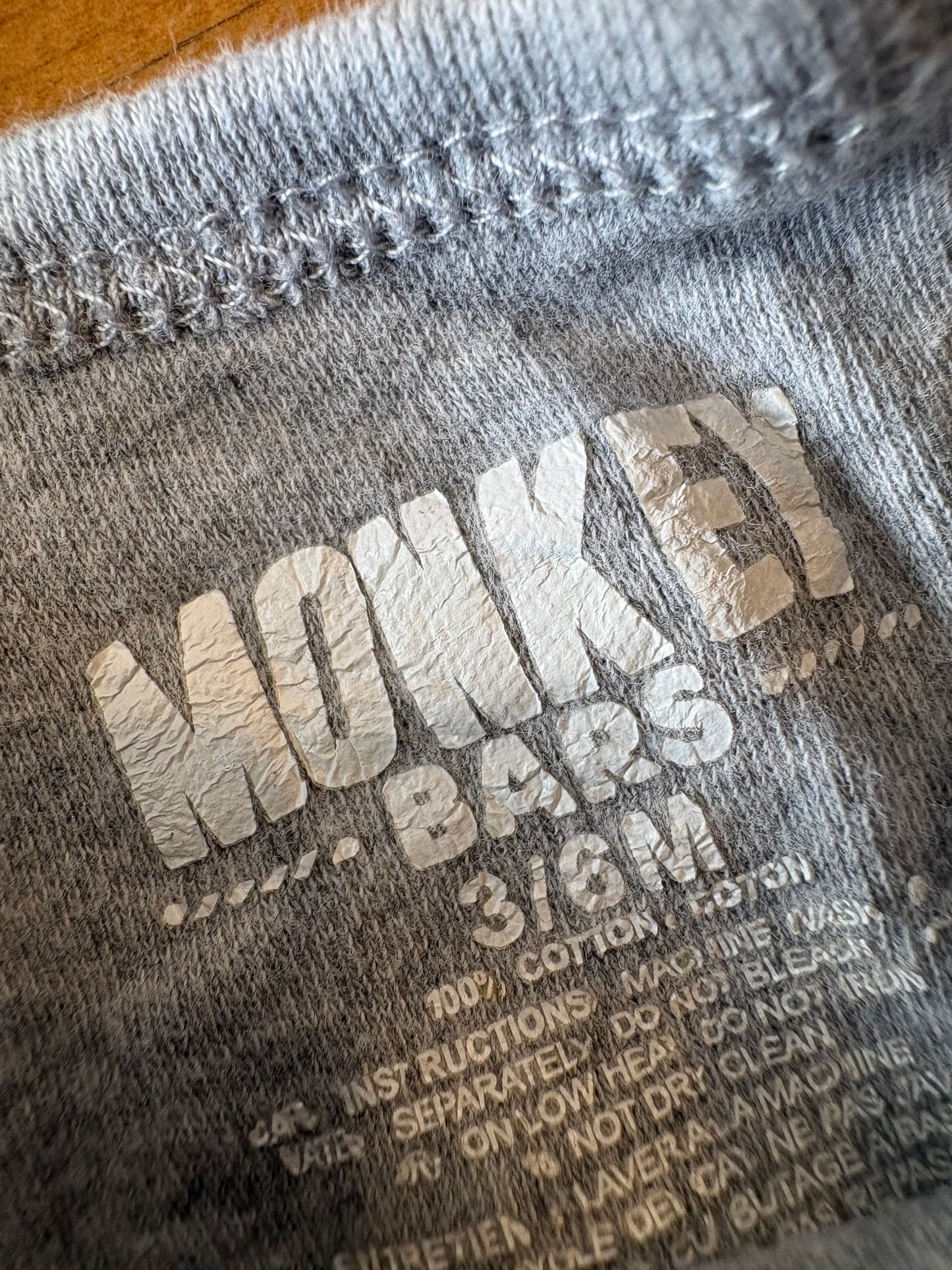 Cache couche monkey bars 3-6 mois