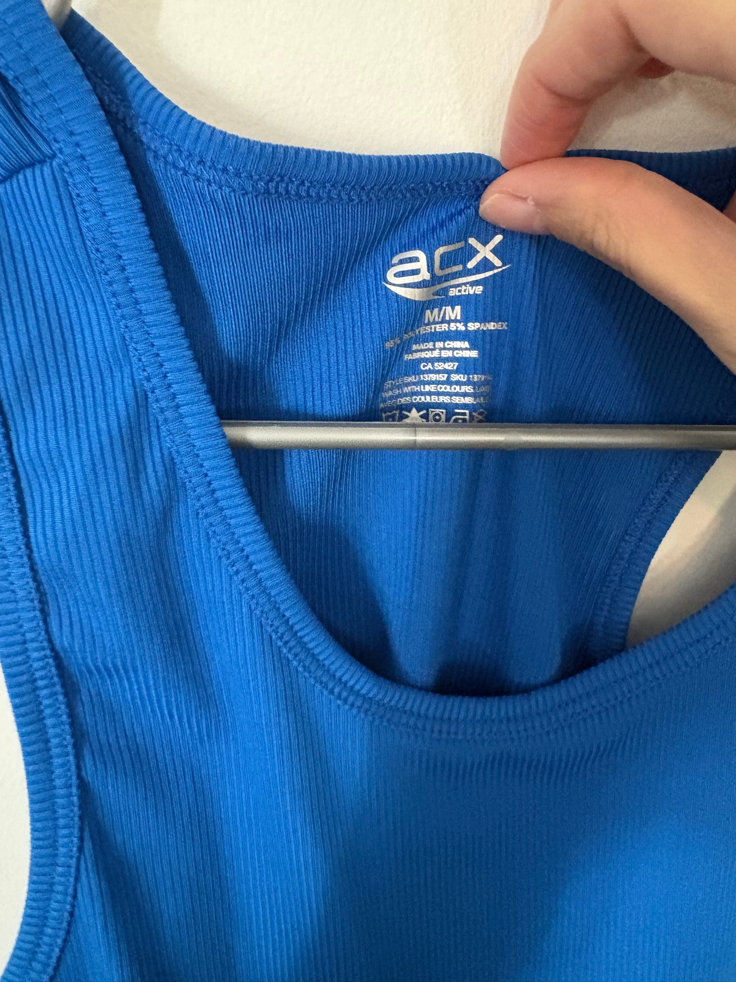 Camisole acx medium état neuf + 20%de rabais applicable au panier